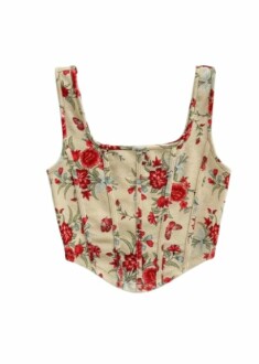 Stylish floral crop top displayed elegantly on a mannequin.